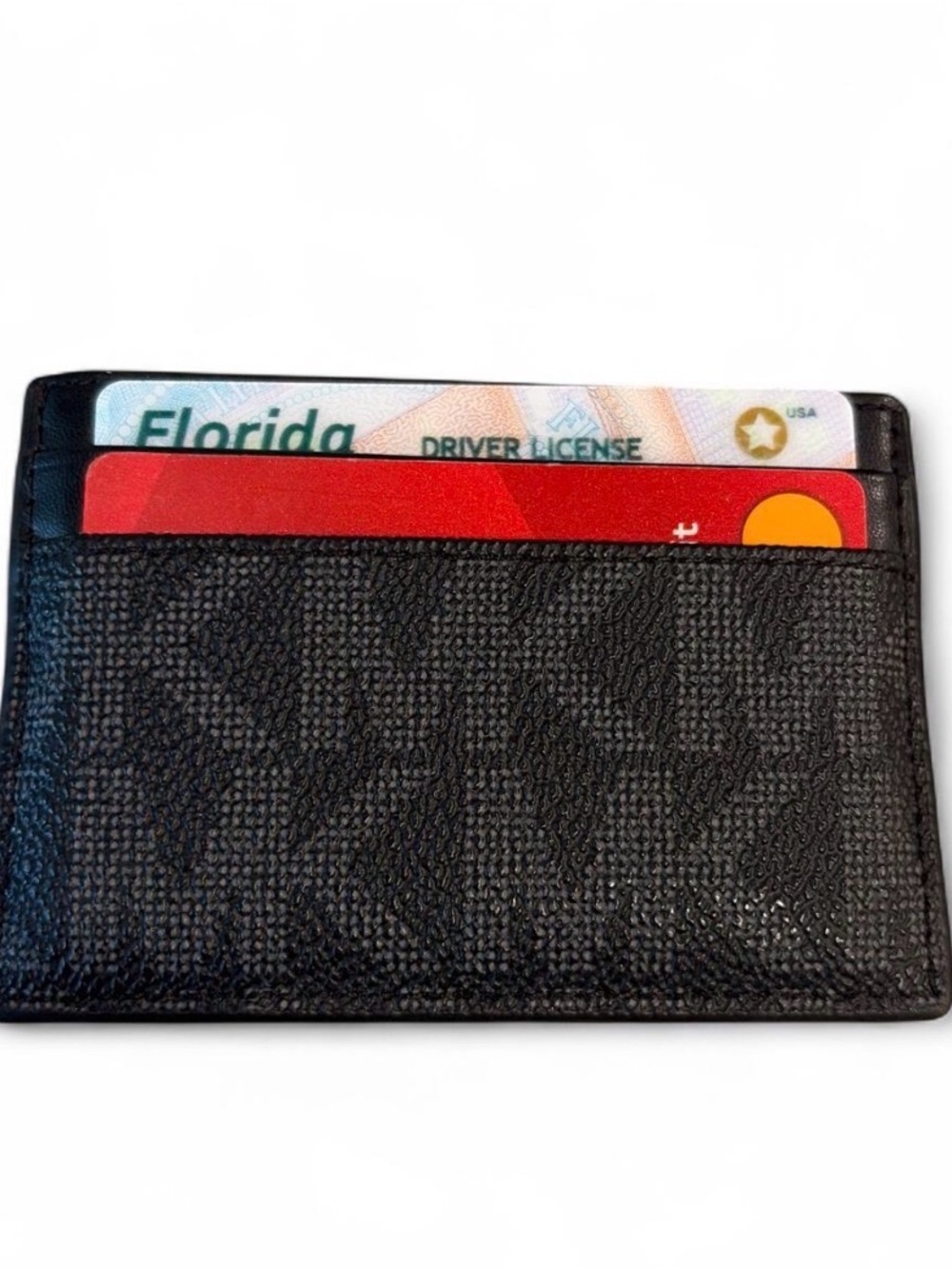 MICHAEL KORS Black Textured Leather Card Sleeve Wallet in excellent condition